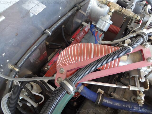 Intake SCAT hose runs straight down the back of the engine